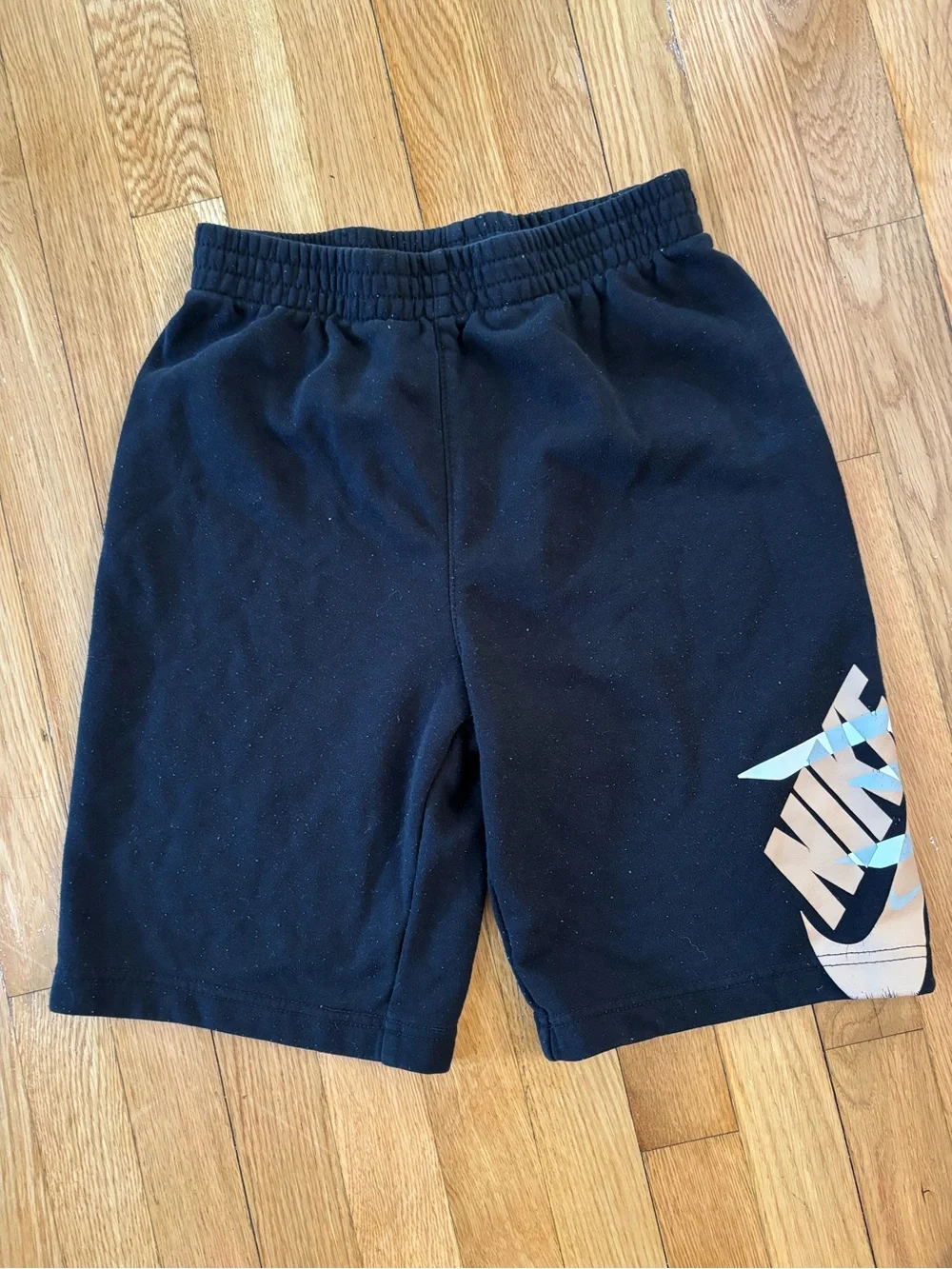 Nike Black Boys Athletic Shorts with White and Gold Logo